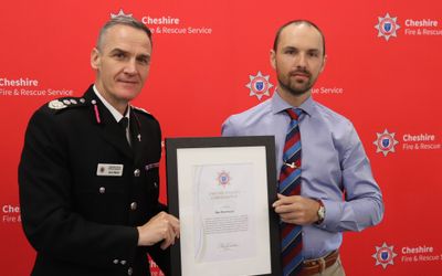 Tree surgeon presented with Chief Fire Officer's Commendation for saving woman from house fire