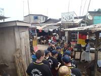 Cadets look around the street of Elmina Castle