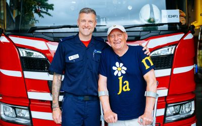 Firefighter reunited with man he rescued from 50ft well 